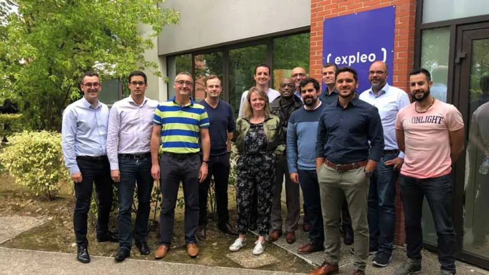 The Expleo team outside their office