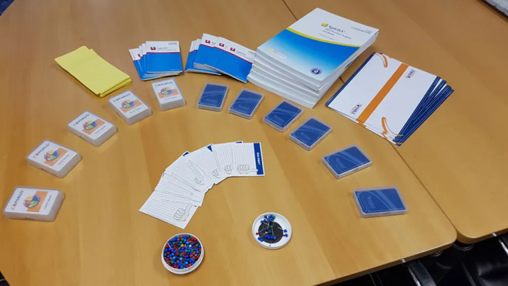 AgilePM study materials strewn across a desk.